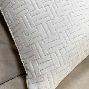 White upholstered pillow